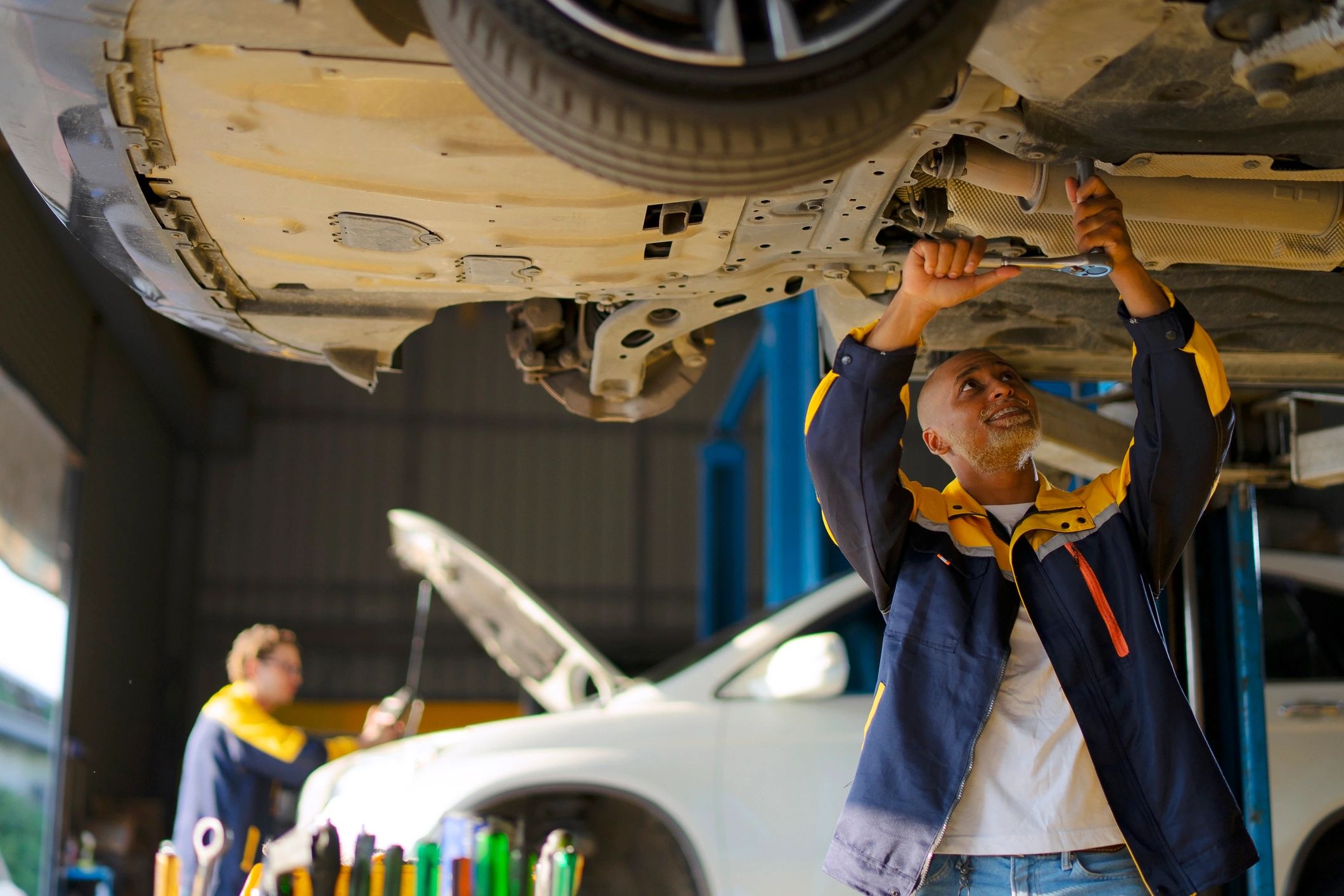 Mechanic working in a car service workshop
